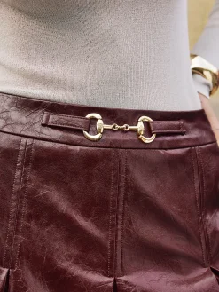 COMMENSE Metal-Detail Pleated Faux Leather Skirt* Skirts|Bottoms